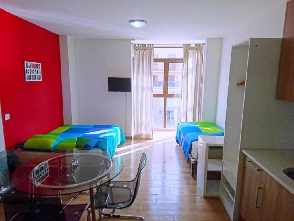 Apartamentos Urgel Madrid Bagian luar foto